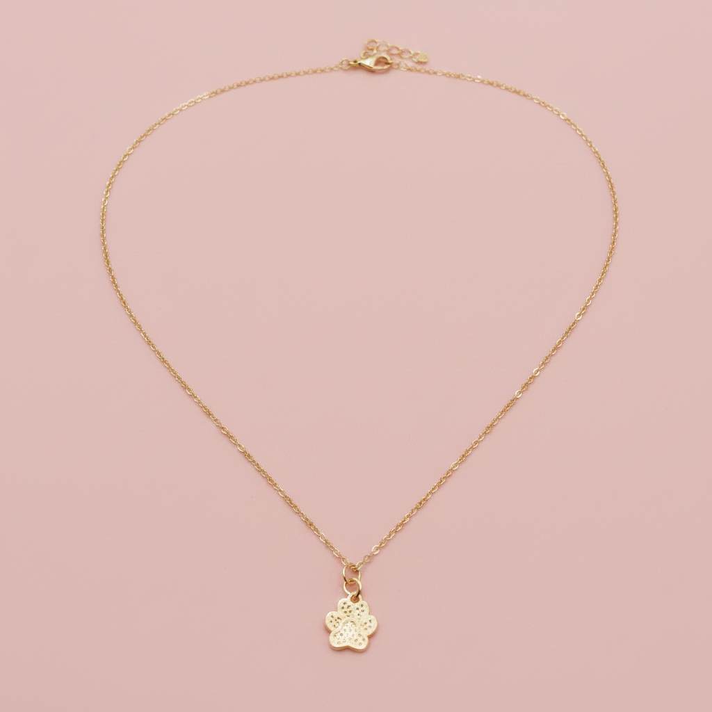 Improved image 3 - gold charm necklace on blush pink background